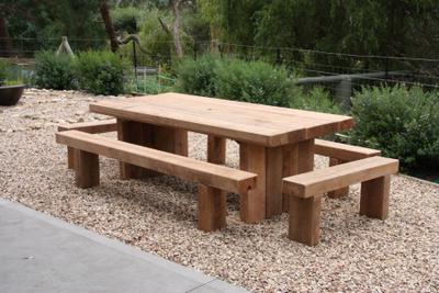 Iron King table setting in spotted gum, handcrafted by TK Garden Heritage